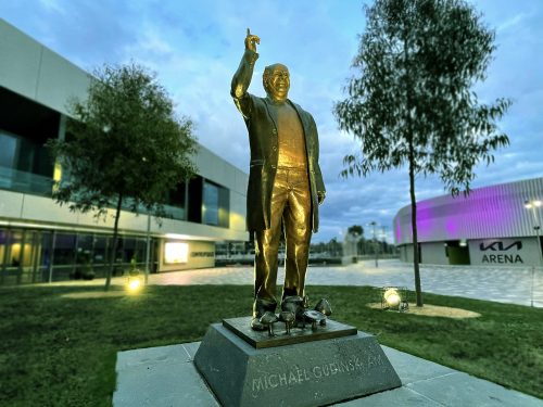 Gudinski Memorial Statue outside Rod Laver Arena with outdoor lighting control surrounding